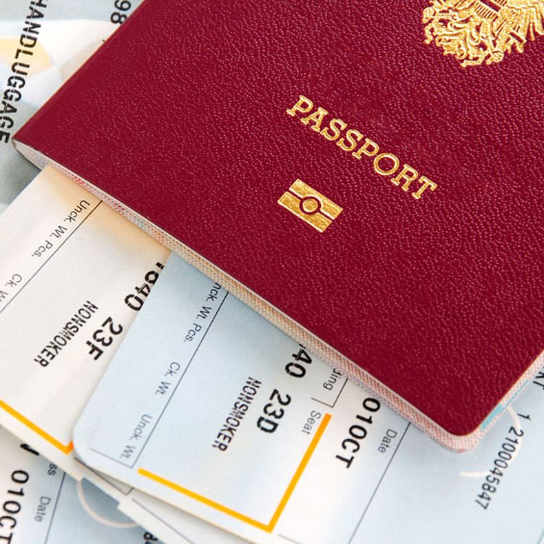 Passport with flight-ticket