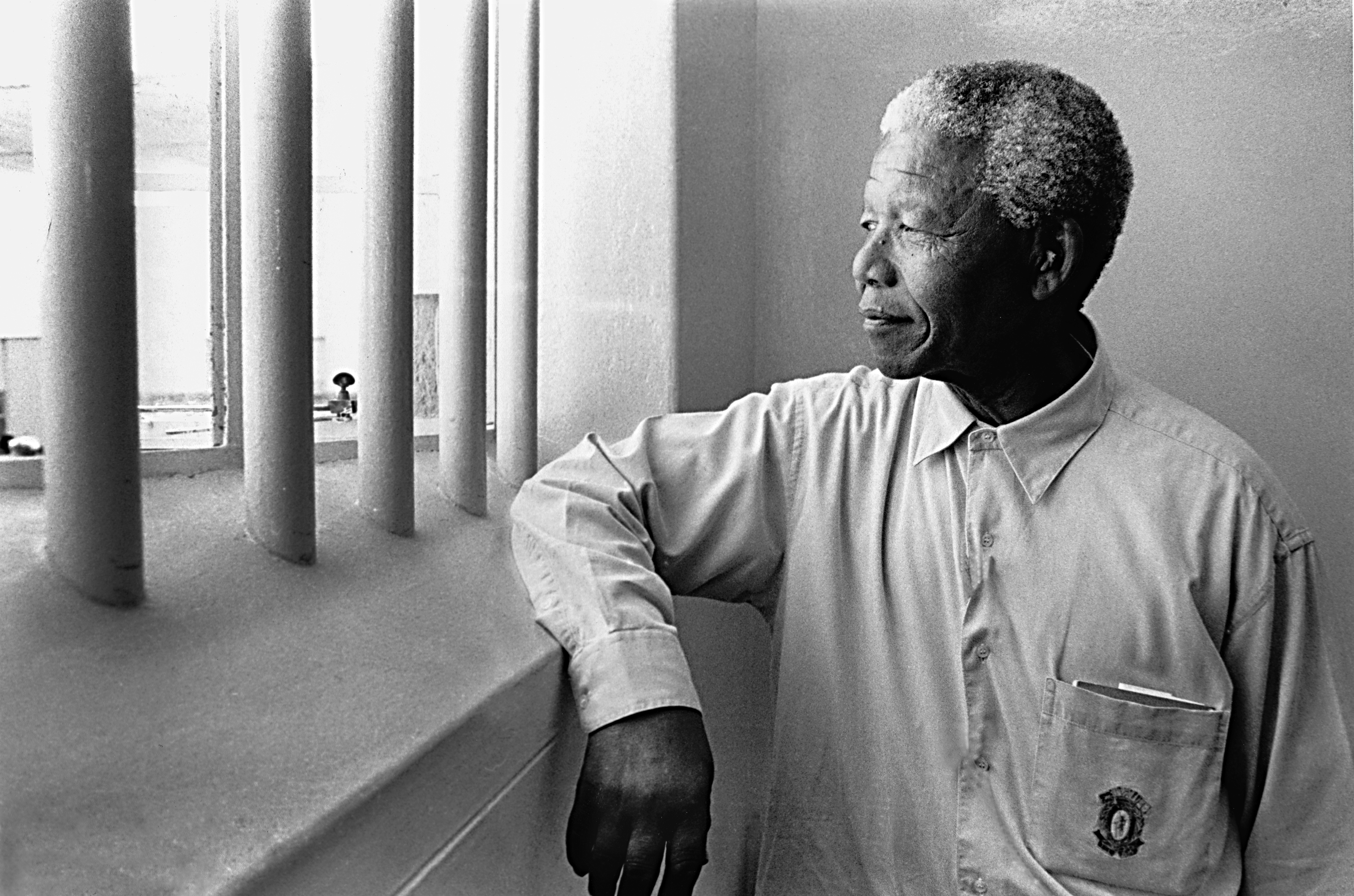 Mandela returns to his cell on Robben Island, 1994, Photograph courtesy of the Jürgen Schadeberg estate.
